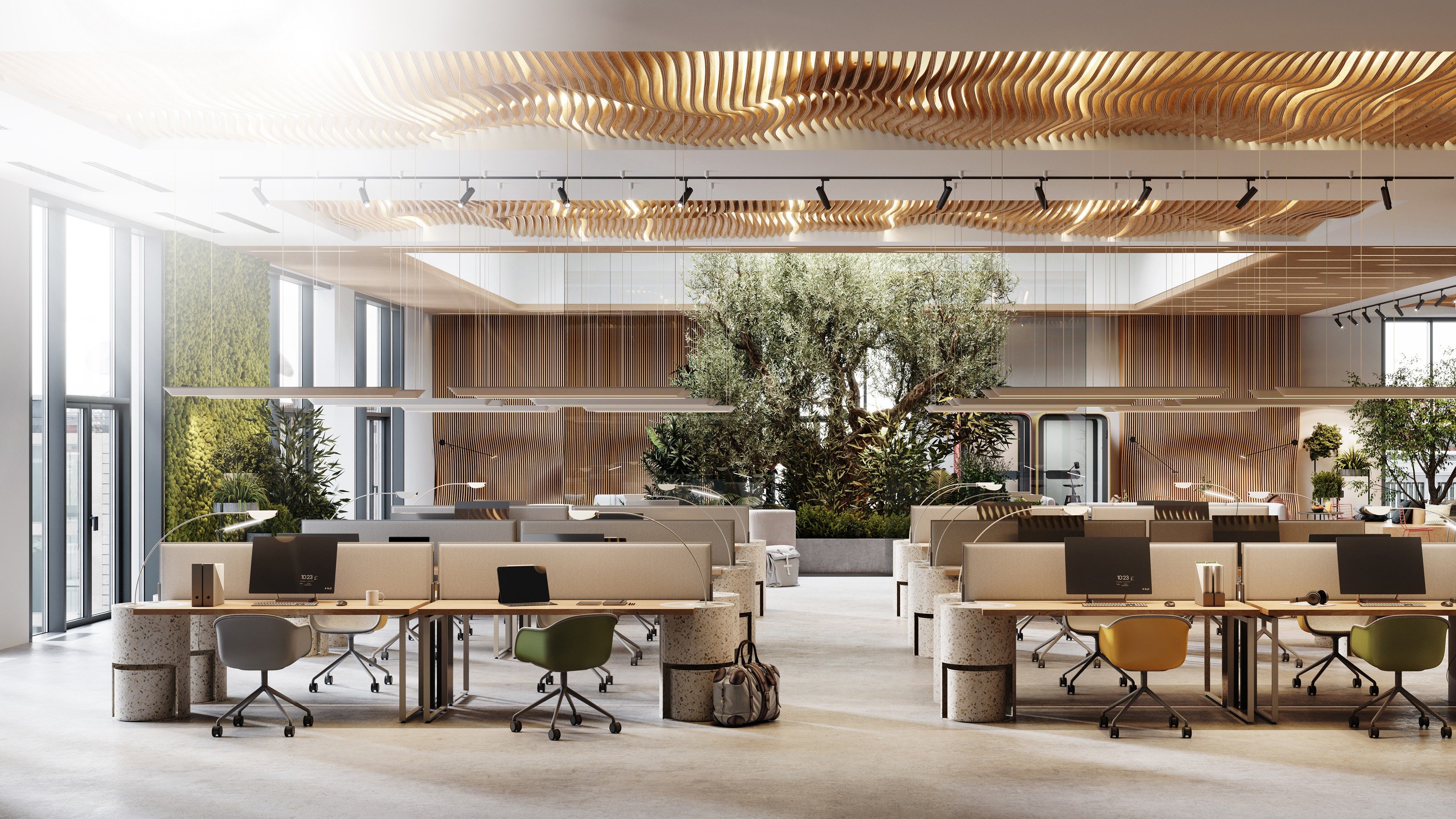 Espace de bureaux moderne avec aménagement végétalisé et postes de travail collaboratifs