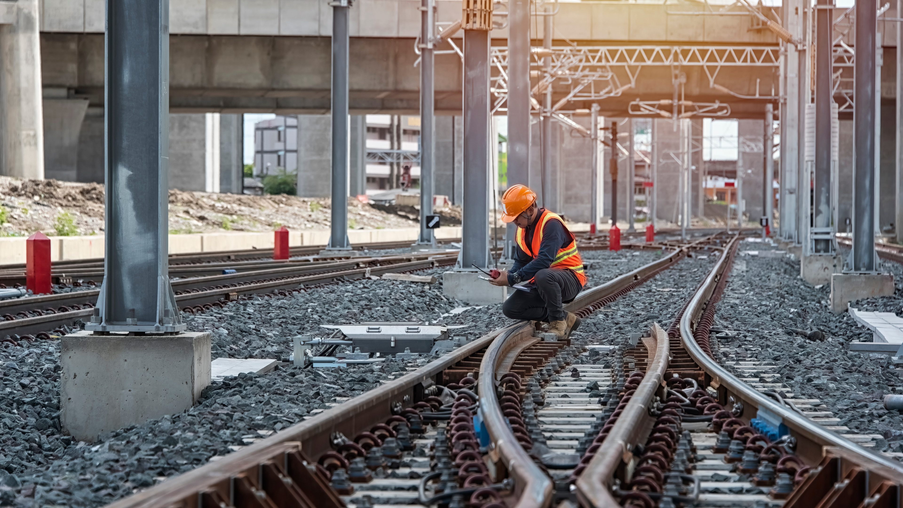 Engineer sitting on railway inspection. construction worker on railways. Engineer work on Railway. Rail, engineer, Infrastructure